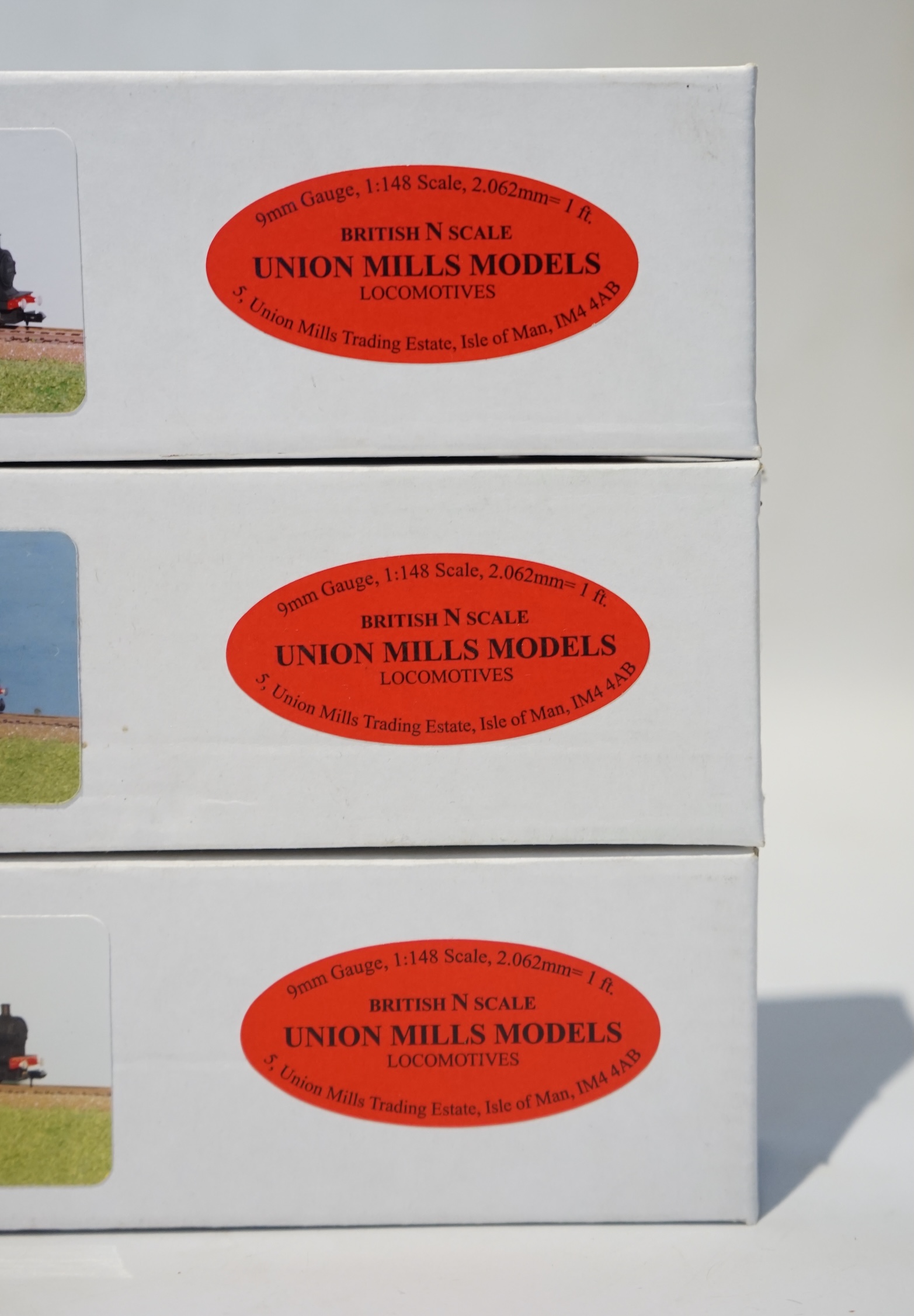 Three boxed Union Mills N gauge railway LMS tender locomotives; a Class G2, 9032, a Class 3F, 3777, and a Class 7F, 9504. Condition - good.